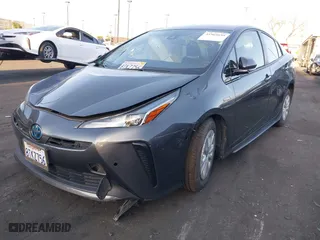 2020 Toyota Prius L Eco with VIN JTDKARFU9L3122010, listed as a IAAI auction lot 41969655 with 76,250 mi miles. Bid and sale history available at carsss.com. Image 2.