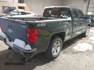 2014 Chevrolet Silverado 1500 LT with VIN 1GCVKREC1EZ387037, listed as a IAAI auction lot 41599250 with 88,291 mi miles. Bid and sale history available at carsss.com. Image 4.