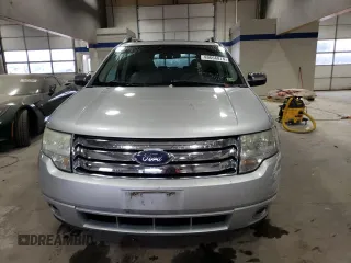 2009 Ford Taurus X Limited with VIN 1FMDK03W59GA01446, listed as a Copart auction lot 80666874 with 135,957 mi miles and Salvage title. Bid and sale history available at DreamBid. Image 5.