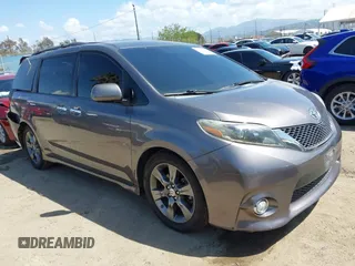 2015 Toyota Sienna SE with VIN 5TDXK3DC0FS679580, listed as a IAAI auction lot 41955067 with 130,301 mi miles and . Bid and sale history available at DreamBid. Image 1.