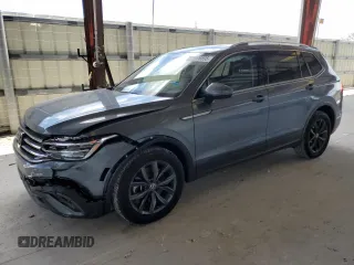 2023 Volkswagen Tiguan SE z VIN 3VVNB7AXXPM056508, wystawiony jako Copart lot #55979595 z przebiegiem 27 009 mil mil oraz Nie do naprawy • Non repairable. Historia ofert i sprzedaży dostępna na DreamBid. Obrazek 1.