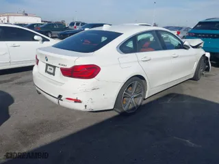 2019 BMW 4 Series 430i with VIN WBA4J1C5XKBM17786, listed as a IAAI auction lot 41597430 with 66,106 mi miles. Bid and sale history available at carsss.com. Image 4.