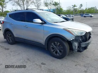 2014 Hyundai Santa Fe Sport with VIN 5XYZU3LB0EG198641, listed as a IAAI auction lot 41673814 with 113,027 mi miles. Bid and sale history available at carsss.com. Image 1.