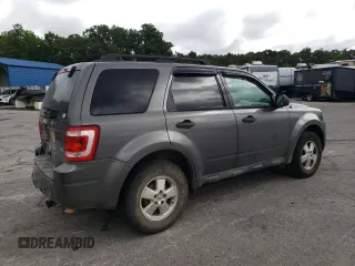 2012 Ford Escape XLT с VIN 1FMCU9DGXCKB34077, выставлен на аукционе Copart как лот 71502944 с пробегом 297 902 миль миль и Списание • Salvage title. История ставок и продаж доступна на DreamBid. Изображение 3.