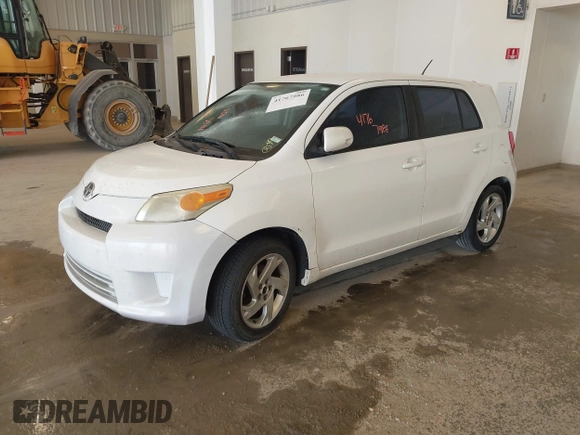 2008 Scion xD with VIN JTKKU10488J002731, listed as a IAAI auction lot 41767986 with 217,135 mi miles. Bid and sale history available at carsss.com. Image 2.
