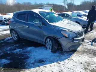 2015 Buick Encore with VIN KL4CJASB9FB194520, listed as a IAAI auction lot 41375542 with 65,753 mi miles. Bid and sale history available at carsss.com. Image 1.