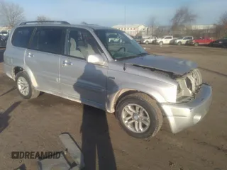 2004 Suzuki XL-7 LX with VIN JS3TX92V744106967, listed as a IAAI auction lot 41119580 with 158,741 mi miles. Bid and sale history available at carsss.com. Image 1.