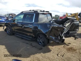 2023 Honda Ridgeline RTL-E with VIN 5FPYK3F71PB024149, listed as a Copart auction lot 50767465 with 40,943 mi miles and Salvage title. Bid and sale history available at DreamBid. Image 2.