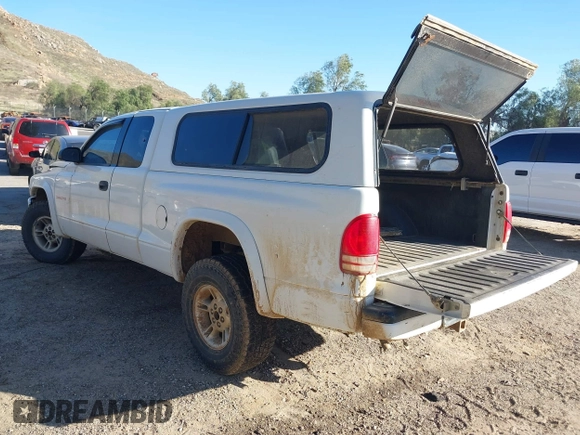 1998 Dodge Dakota SLT with VIN 1B7GG22Y6WS558179, listed as a IAAI auction lot 41673558 with 252,084 mi miles. Bid and sale history available at carsss.com. Image 3.