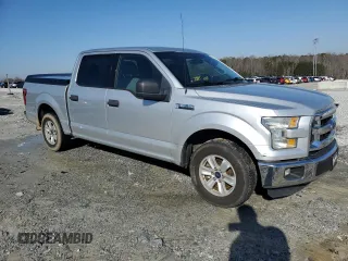 2015 Ford F-150 XLT with VIN 1FTEW1C88FKD74865, listed as a Copart auction lot 48251125 with 215,845 mi miles and Salvage Title. Bid and sale history available at carsss.com. Image 4.