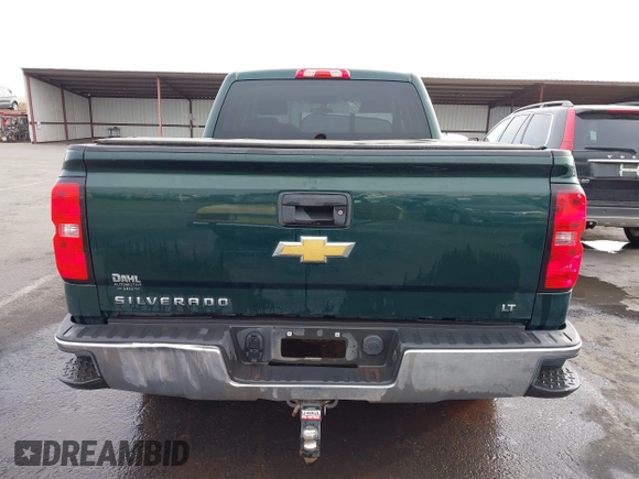 2014 Chevrolet Silverado 1500 LT with VIN 1GCVKREC7EZ312679, listed as a IAAI auction lot 40874395 with 153,234 mi miles and . Bid and sale history available at DreamBid. Image 16.