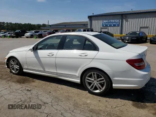 2014 Mercedes-Benz C 250 Sport with VIN WDDGF4HB3ER312977, listed as a Copart auction lot 52712205 with 133,862 mi miles and Salvage title. Bid and sale history available at DreamBid. Image 2.
