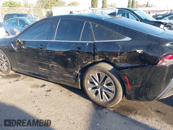 2022 Toyota Mirai XLE with VIN JTDAAAAA9NA007013, listed as a IAAI auction lot 41744965 with 23,243 mi miles and . Bid and sale history available at DreamBid. Image 6.