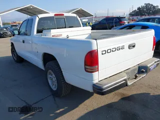 2002 Dodge Dakota with VIN 1B7GL12X62S519941, listed as a IAAI auction lot 41459153 with 259,726 mi miles and . Bid and sale history available at carsss.com. Image 3.