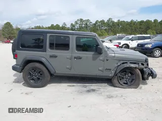 2021 Jeep Wrangler Unlimited Sport S with VIN 1C4HJXDG1MW594522, listed as a IAAI auction lot 41715891 with 88,821 mi miles. Bid and sale history available at carsss.com. Image 13.