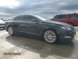 2013 Lincoln MKZ z VIN 3LN6L2G99DR826820, wystawiony jako Copart lot #57530205 z przebiegiem 161 494 mil mil oraz Czysty tytuł • Clean title. Historia ofert i sprzedaży dostępna na DreamBid. Obrazek 4.