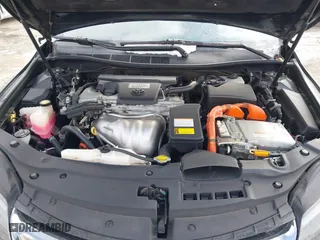 2015 Toyota Camry Hybrid LE with VIN 4T1BD1FK5FU166653, listed as a IAAI auction lot 41412963 with 105,428 mi miles. Bid and sale history available at carsss.com. Image 10.