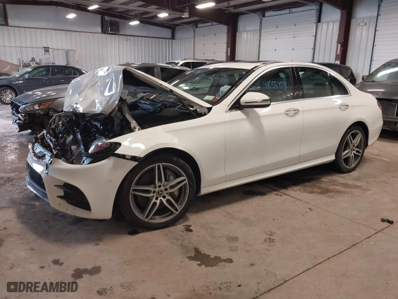 2017 Mercedes-Benz E-Class E 300 Luxury with VIN WDDZF4KB3HA233328, listed as a IAAI auction lot 41656478 with 77,509 mi miles. Bid and sale history available at carsss.com. Image 17.