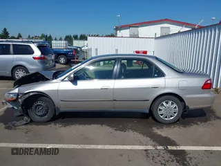 1999 Honda Accord LX with VIN JHMCG5545XC028563, listed as a IAAI auction lot 42461054 with 212,100 mi miles and . Bid and sale history available at DreamBid. Image 15.