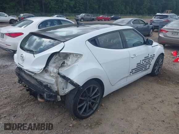 2013 Hyundai Veloster w/Gray Int z VIN KMHTC6AD3DU131703, wystawiony jako IAAI lot #42468831 z przebiegiem 188 513 mil mil oraz . Historia ofert i sprzedaży dostępna na DreamBid. Obrazek 4.