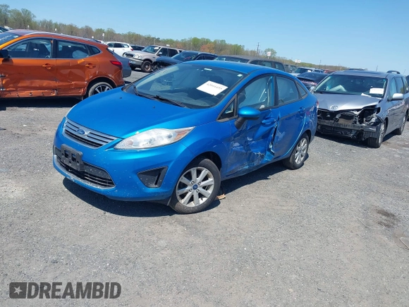 2012 Ford Fiesta SE with VIN 3FADP4BJXCM125881, listed as a IAAI auction lot 42044455 with 156,804 mi miles. Bid and sale history available at carsss.com. Image 2.
