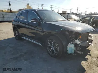 2019 BMW X1 sDrive28i with VIN WBXHU7C59K5N01520, listed as a Copart auction lot 44910215 with 44,239 mi miles and Salvage Title. Bid and sale history available at carsss.com. Image 4.
