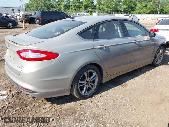 2015 Ford Fusion SE Hybrid with VIN 3FA6P0LU7FR243498, listed as a IAAI auction lot 42719986 with 345,098 mi miles and . Bid and sale history available at DreamBid. Image 4.