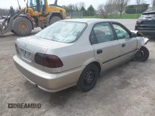 2000 Honda Civic LX with VIN 1HGEJ6670YL030749, listed as a IAAI auction lot 42112694 with 153,903 mi miles. Bid and sale history available at carsss.com. Image 4.