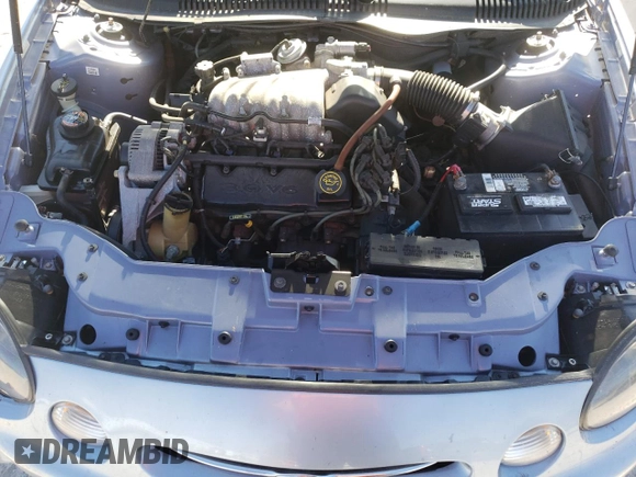 1998 Ford Taurus LX z VIN 1FAFP52U5WA273382, wystawiony jako Copart lot #77102854 z przebiegiem 73 014 mil mil oraz Szkoda całkowita • Salvage title. Historia ofert i sprzedaży dostępna na DreamBid. Obrazek 11.