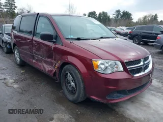 2017 Dodge Grand Caravan SE z VIN 2C4RDGBG8HR793970, wystawiony jako IAAI lot #41691933 z przebiegiem 107 055 mil mil oraz . Historia ofert i sprzedaży dostępna na DreamBid. Obrazek 1.