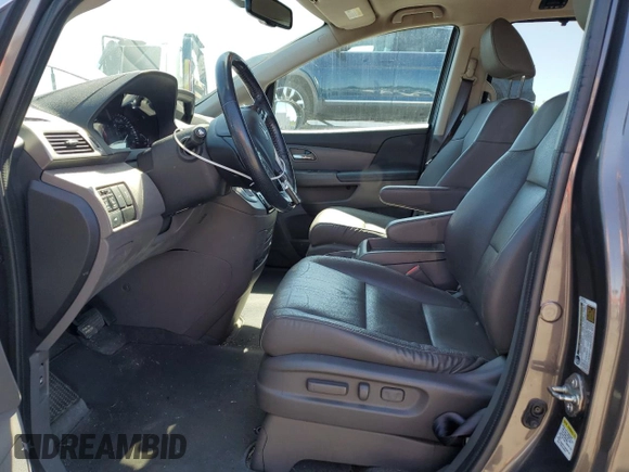2016 Honda Odyssey EX-L with VIN 5FNRL5H64GB133828, listed as a Copart auction lot 53992655 with 68,905 mi miles and Salvage Title. Bid and sale history available at DreamBid. Image 7.