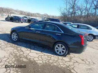 2016 Cadillac ATS Standard AWD z VIN 1G6AG5RX5G0103585, wystawiony jako IAAI lot #41439995 z przebiegiem 58 615 mil mil oraz . Historia ofert i sprzedaży dostępna na DreamBid. Obrazek 3.