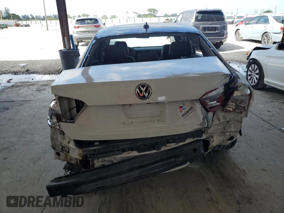 2015 Volkswagen Passat SE with VIN 1VWBS7A33FC026231, listed as a Copart auction lot 52021205 with 180,507 mi miles and Salvage title. Bid and sale history available at DreamBid. Image 6.