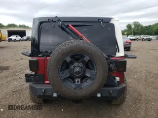 2012 Jeep Wrangler Unlimited Sport with VIN 1C4BJWDG6CL234419, listed as a Copart auction lot 62284825 with 66,649 mi miles and Salvage title. Bid and sale history available at DreamBid. Image 6.