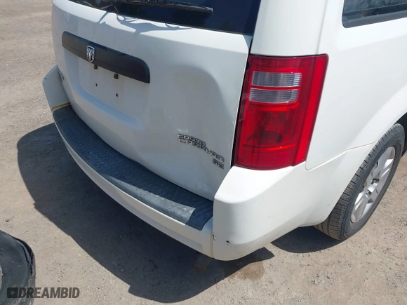 2010 Dodge Grand Caravan SE with VIN 2D4RN4DE0AR107498, listed as a IAAI auction lot 42048596 with 242,643 mi miles. Bid and sale history available at carsss.com. Image 13.