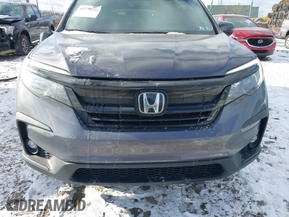 2022 Honda Pilot Special Edition with VIN 5FNYF6H20NB063506, listed as a IAAI auction lot 41239636 with 59,752 mi miles. Bid and sale history available at carsss.com. Image 11.