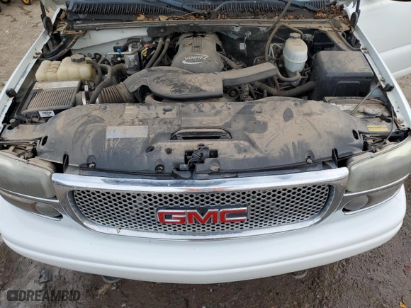 2004 GMC Yukon Denali with VIN 1GKEK63U84J270731, listed as a Copart auction lot 49094635 with 184,529 mi miles and Salvage Title. Bid and sale history available at carsss.com. Image 12.