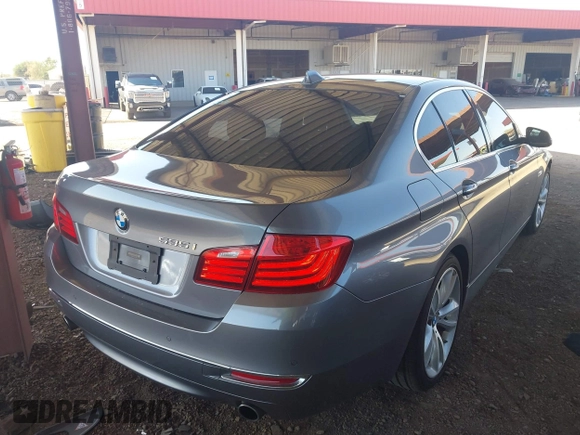 2016 BMW 5 Series 535i with VIN WBA5B1C54GG130262, listed as a IAAI auction lot 41755116 with 125,128 mi miles and . Bid and sale history available at DreamBid. Image 4.