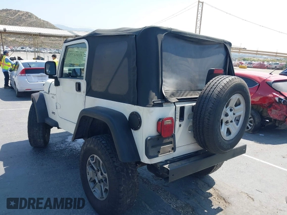 2003 Jeep Wrangler X with VIN 1J4FA39S73P321181, listed as a IAAI auction lot 42462732 with 170,460 mi miles and . Bid and sale history available at DreamBid. Image 3.