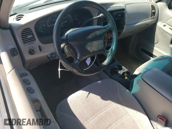 1998 Ford Explorer Sport с VIN 1FMYU22X0WUC49831, выставлен на аукционе Copart как лот 52305105 с пробегом 179 547 миль миль и Списание • Salvage title. История ставок и продаж доступна на DreamBid. Изображение 8.