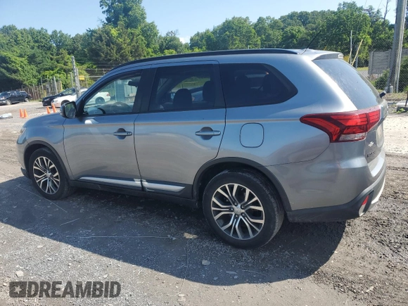 2016 Mitsubishi Outlander SE with VIN JA4AZ3A30GZ000679, listed as a Copart auction lot 61817885 with 81,316 mi miles and Salvage title. Bid and sale history available at DreamBid. Image 2.