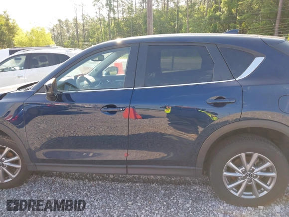 2023 Mazda CX-5 S Preferred with VIN JM3KFBCM1P0260992, listed as a IAAI auction lot 42192977 with 22,445 mi miles and . Bid and sale history available at carsss.com. Image 15.