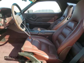 1985 Porsche 928 z VIN WP0JB0927FS862258, wystawiony jako Copart lot #71369064 z przebiegiem 32 896 mil mil oraz Szkody całkowita. Historia ofert i sprzedaży dostępna na DreamBid. Obrazek 7.