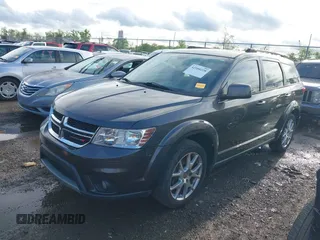 2014 Dodge Journey SXT with VIN 3C4PDCBB3ET172374, listed as a IAAI auction lot 42188228 with 138,129 mi miles. Bid and sale history available at carsss.com. Image 2.