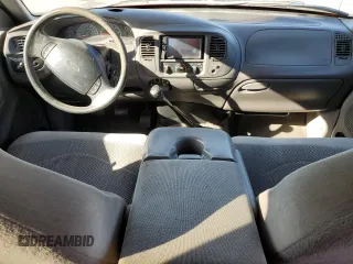 1999 Ford F-150 with VIN 1FTRX07W2XKC24186, listed as a Copart auction lot 74553294 with Not provided miles and Salvage title. Bid and sale history available at DreamBid. Image 8.