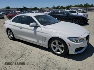 2015 BMW 4 Series 428i with VIN WBA3V7C59FP771861, listed as a Copart auction lot 56562525 with 64,273 mi miles and Salvage title. Bid and sale history available at DreamBid. Image 4.