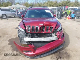 2014 Jeep Cherokee Latitude with VIN 1C4PJLCB1EW208600, listed as a IAAI auction lot 41732264 with 84,718 mi miles. Bid and sale history available at carsss.com. Image 12.