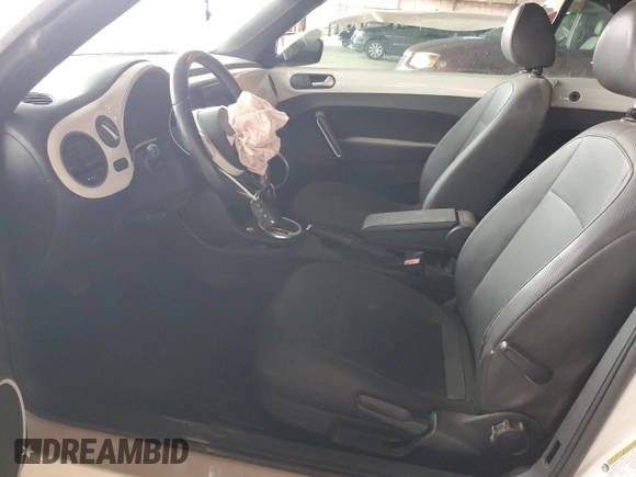 2013 Volkswagen Beetle 2.5L with VIN 3VW5P7AT2DM811768, listed as a Copart auction lot 55799135 with 60,505 mi miles and Salvage Title. Bid and sale history available at DreamBid. Image 7.