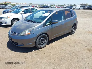 2013 Honda Fit z VIN JHMGE8H34DC082914, wystawiony jako IAAI lot #42288271 z przebiegiem 186 269 mil mil oraz . Historia ofert i sprzedaży dostępna na DreamBid. Obrazek 2.