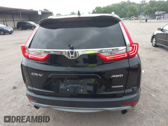 2017 Honda CR-V Touring with VIN 2HKRW2H96HH672017, listed as a IAAI auction lot 42151118 with 144,527 mi miles and . Bid and sale history available at carsss.com. Image 17.